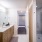 Spacious Bathrooms with Full-Sized Bathtubs or Walk-In Showers