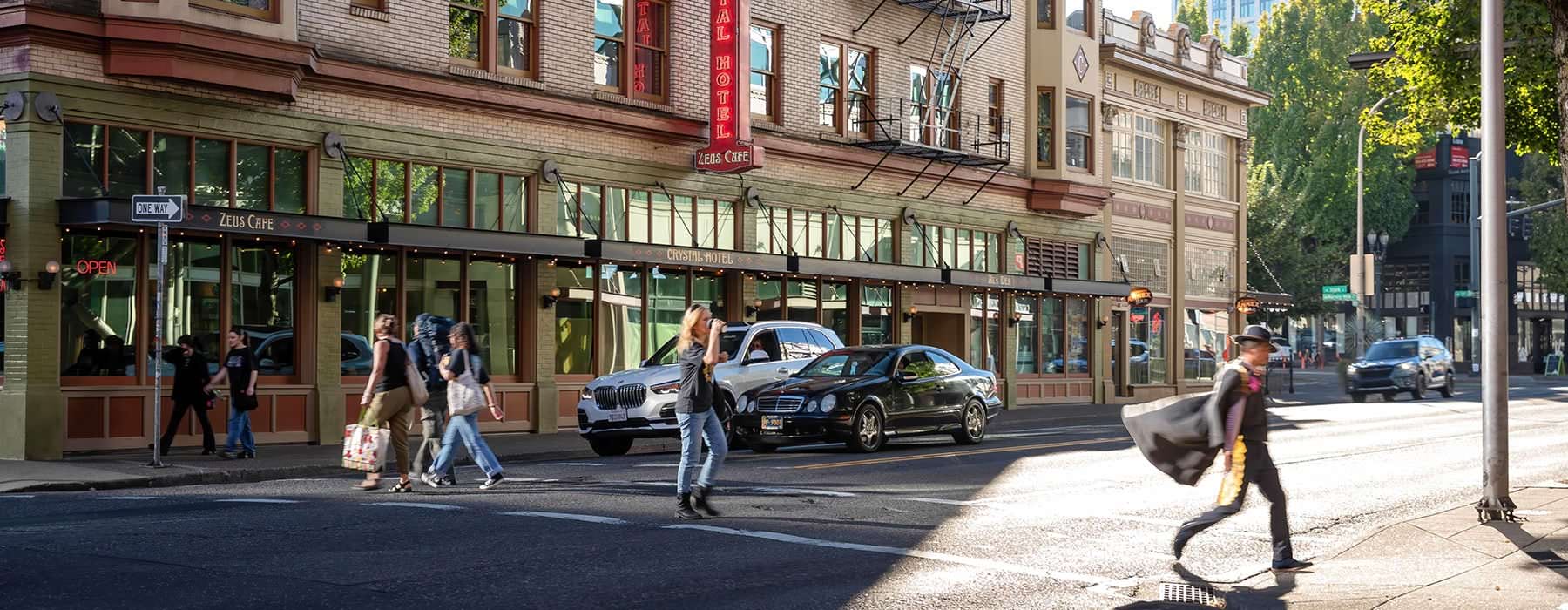people cross neighborhood street