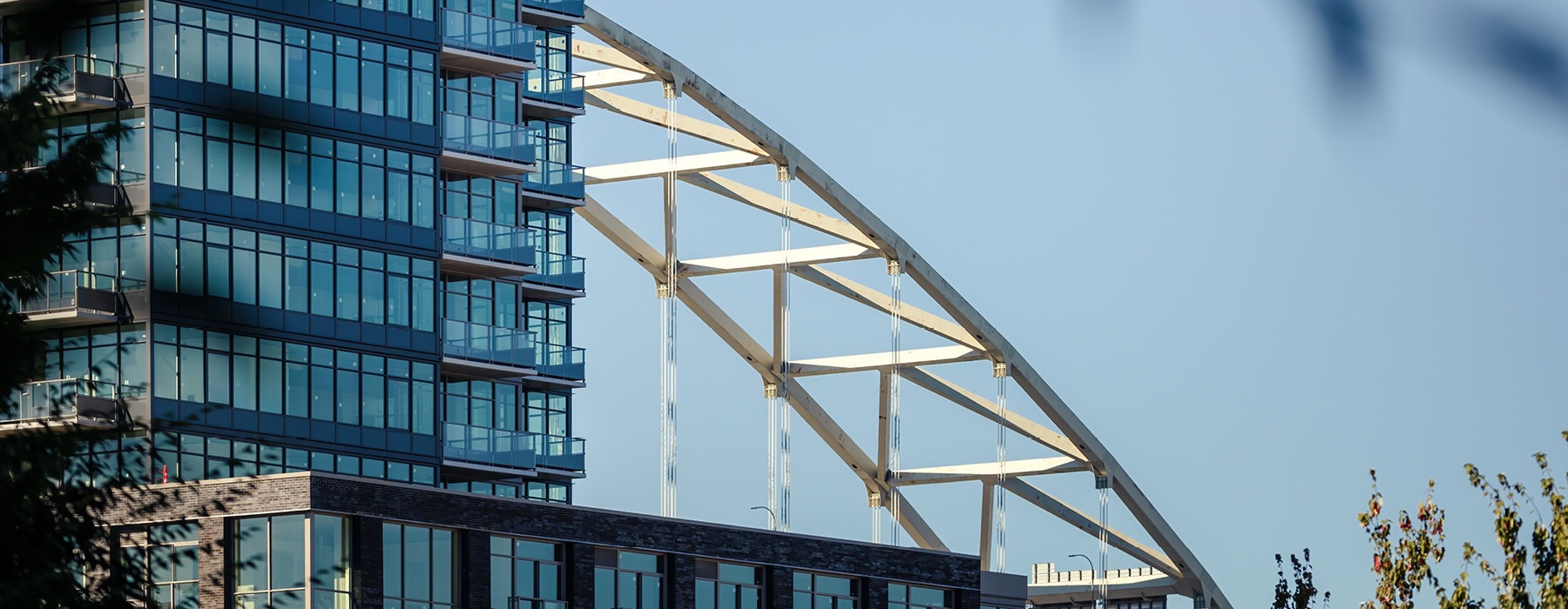 close up of The Sutton with bridge in the background